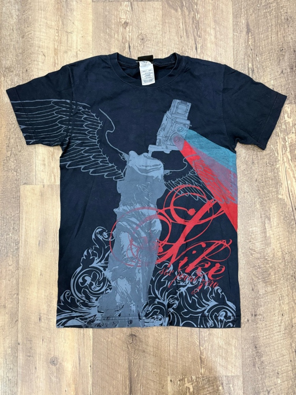 Early 2000s Small Nike 6.0 Black & red graphic tee with angel design